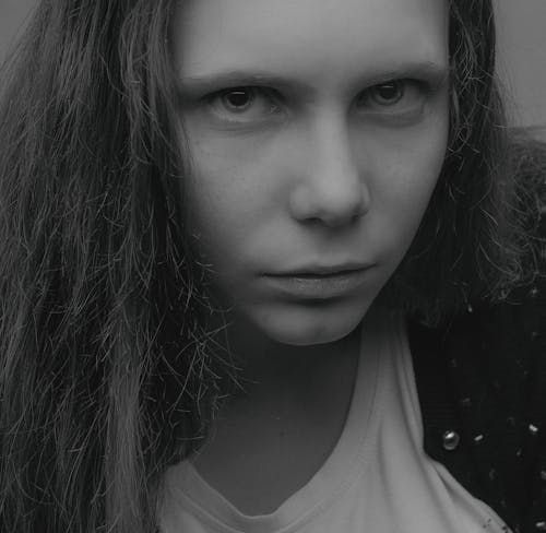 Grayscale Photo of a Woman