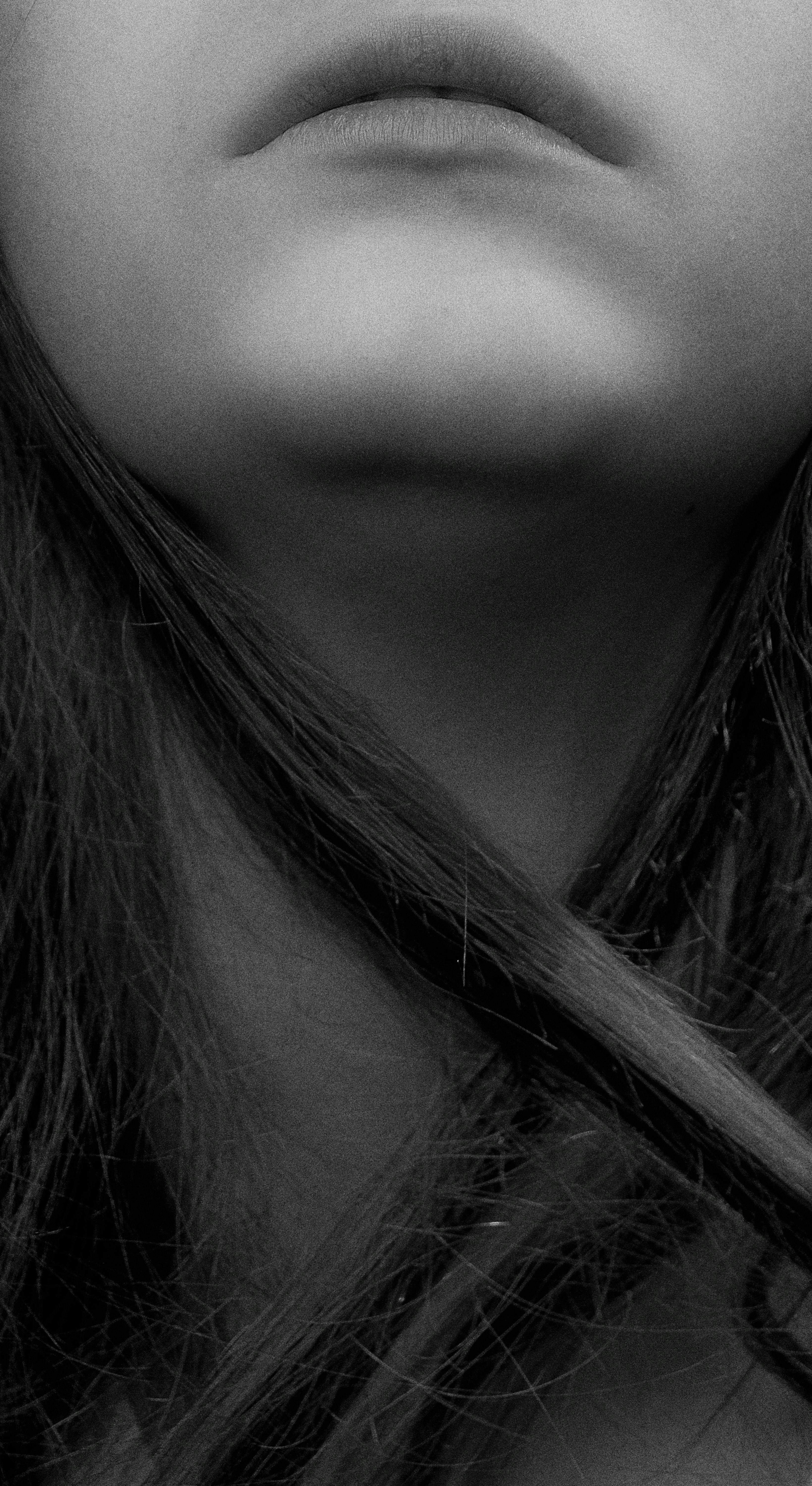 a close up shot of a woman s chin