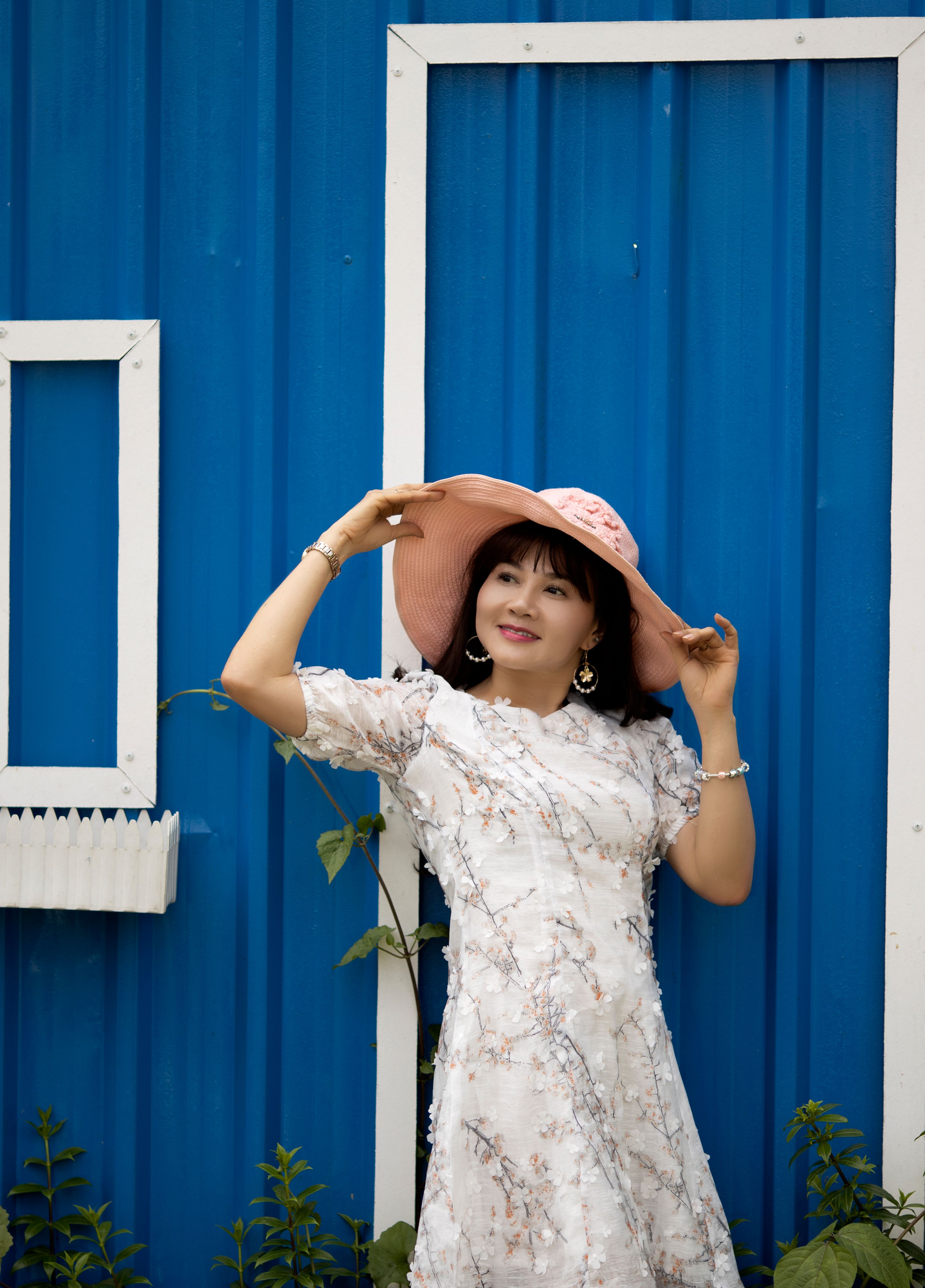 Portrait of a Woman Wearing a Hat · Free Stock Photo