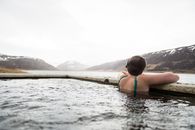 A Person Wearing Knit Cap Soaking in a Pool
