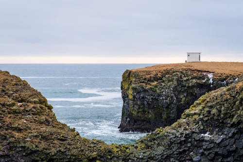 Free A Coastal Cliff with a View of the Horizon Stock Photo