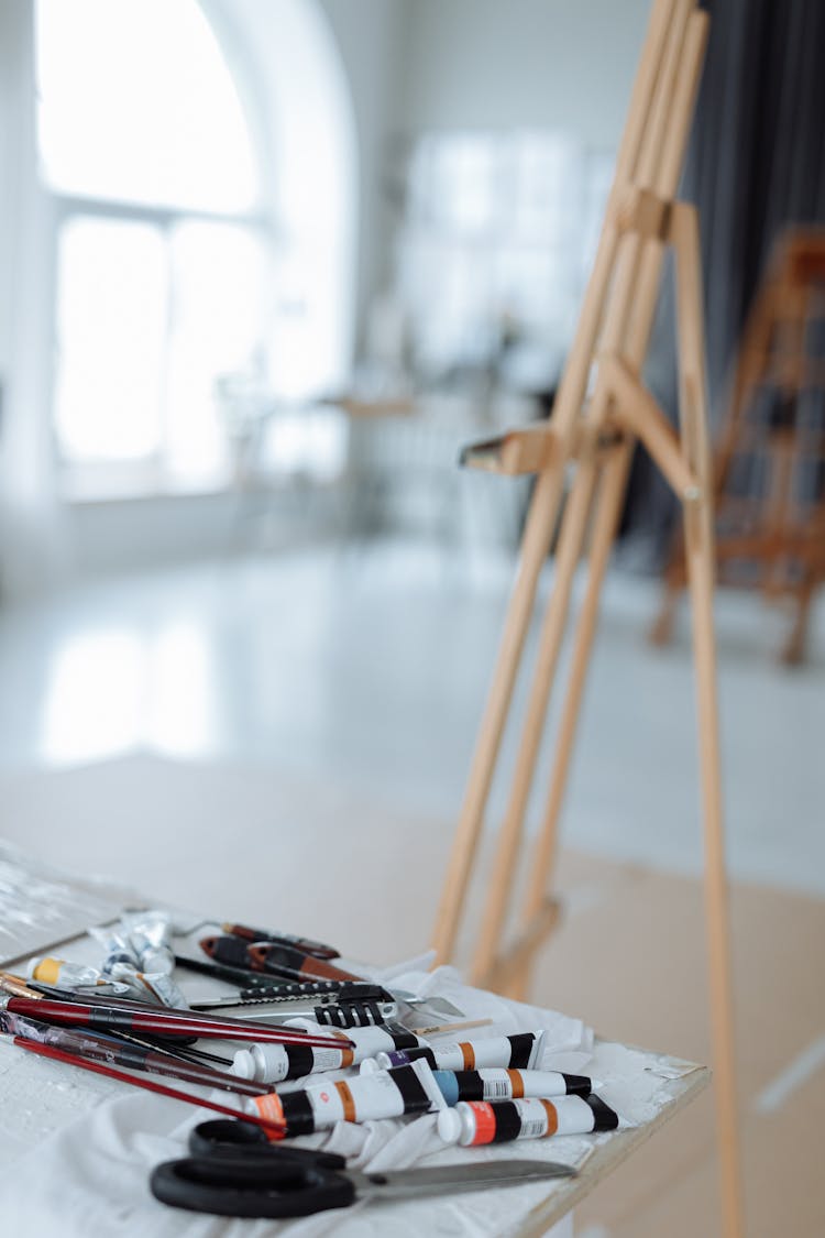 Paints And Brushes On A Table