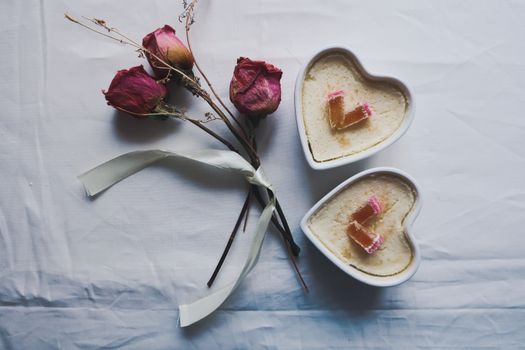 Dried Roses Near the Heart Shaped Ramekins