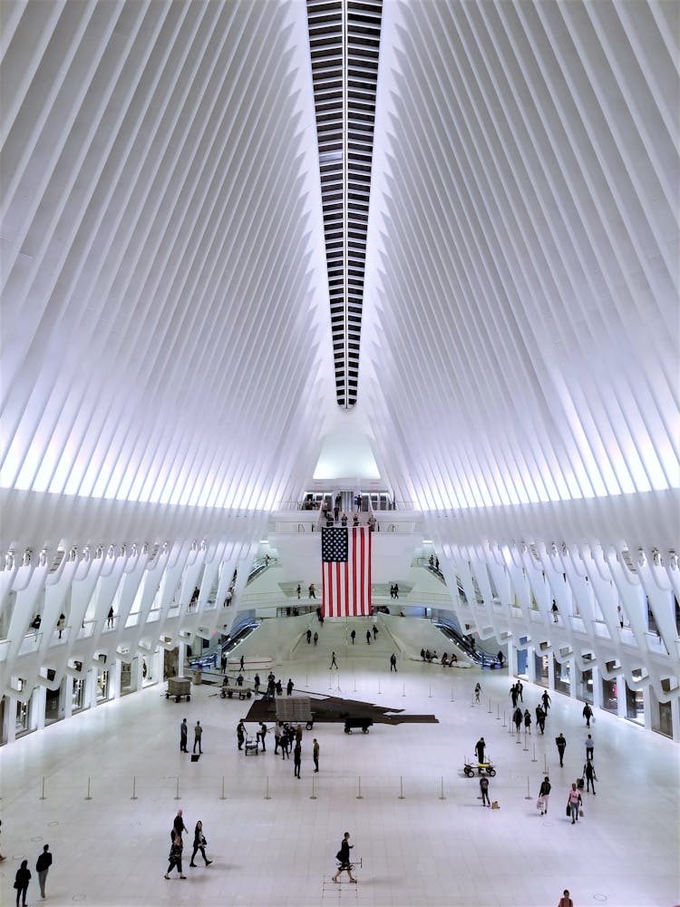 People Walking Inside The World Trade Center Building