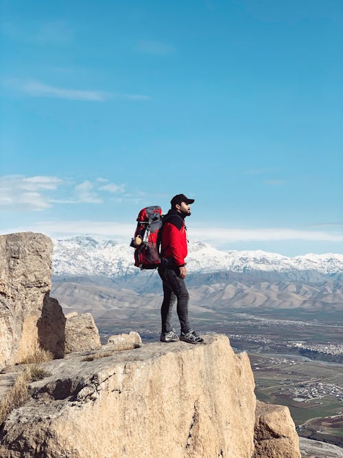 A Man Standing on the Cliff