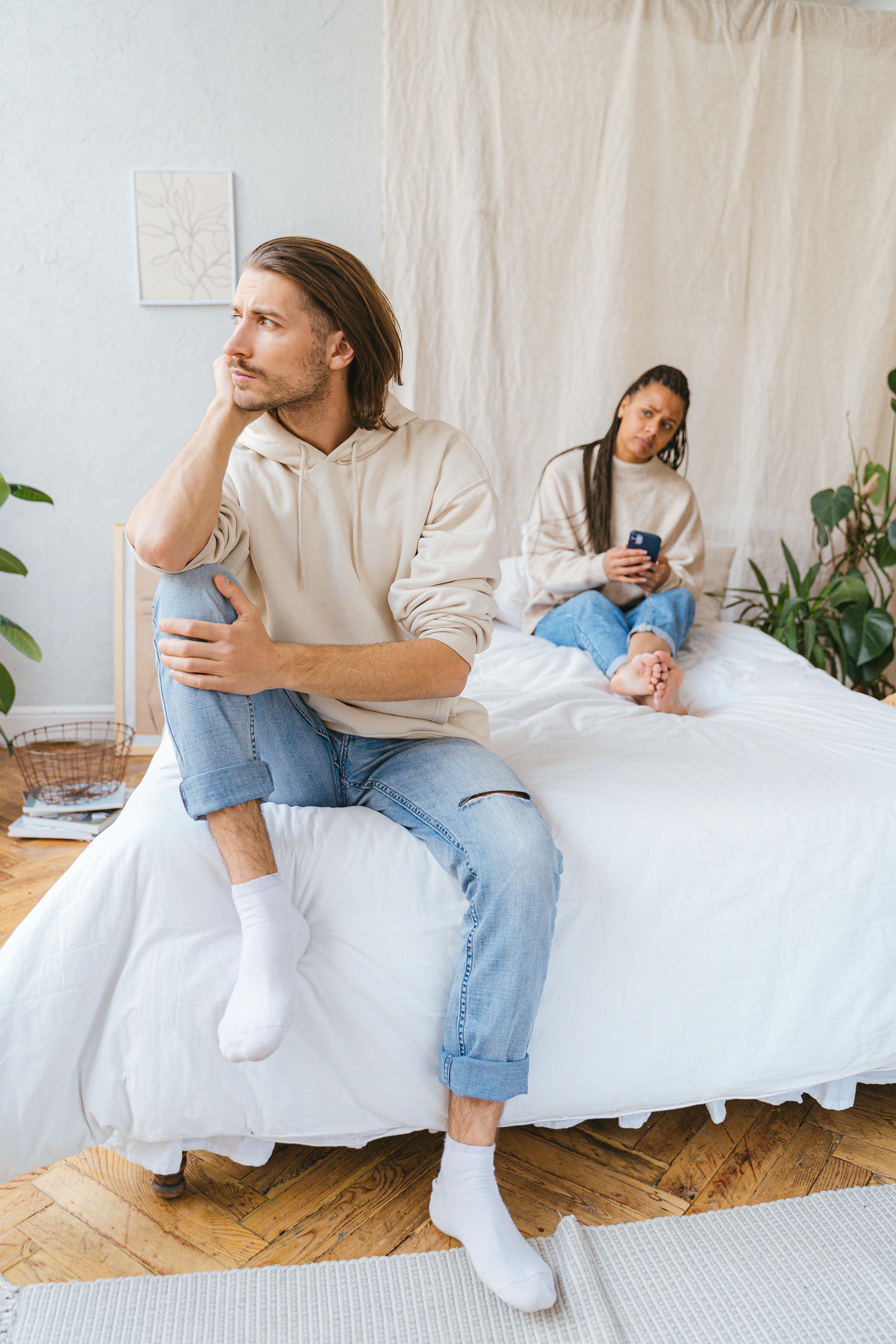 woman and man on bed