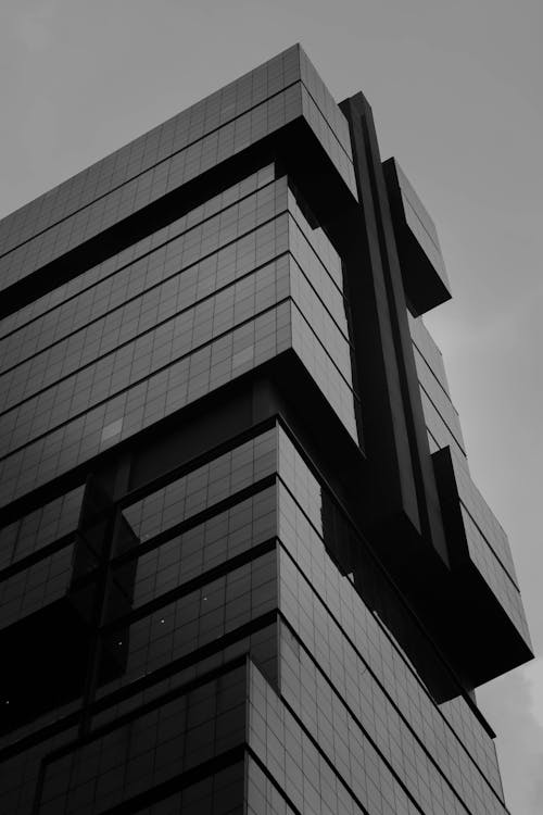 Grayscale Photo of a High-Rise Building