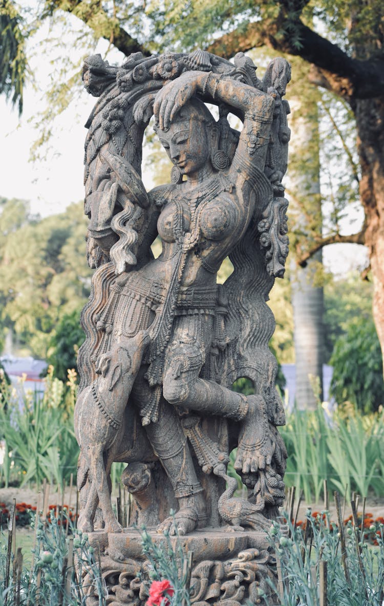 Old Sandstone Dancing Lady Statue