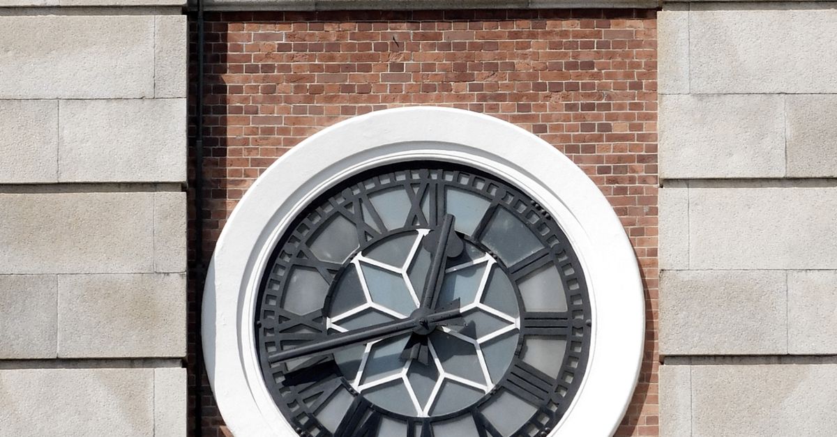 Building exterior with clock and windows · Free Stock Photo