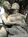 Gray Concrete Statue Near Green Tree