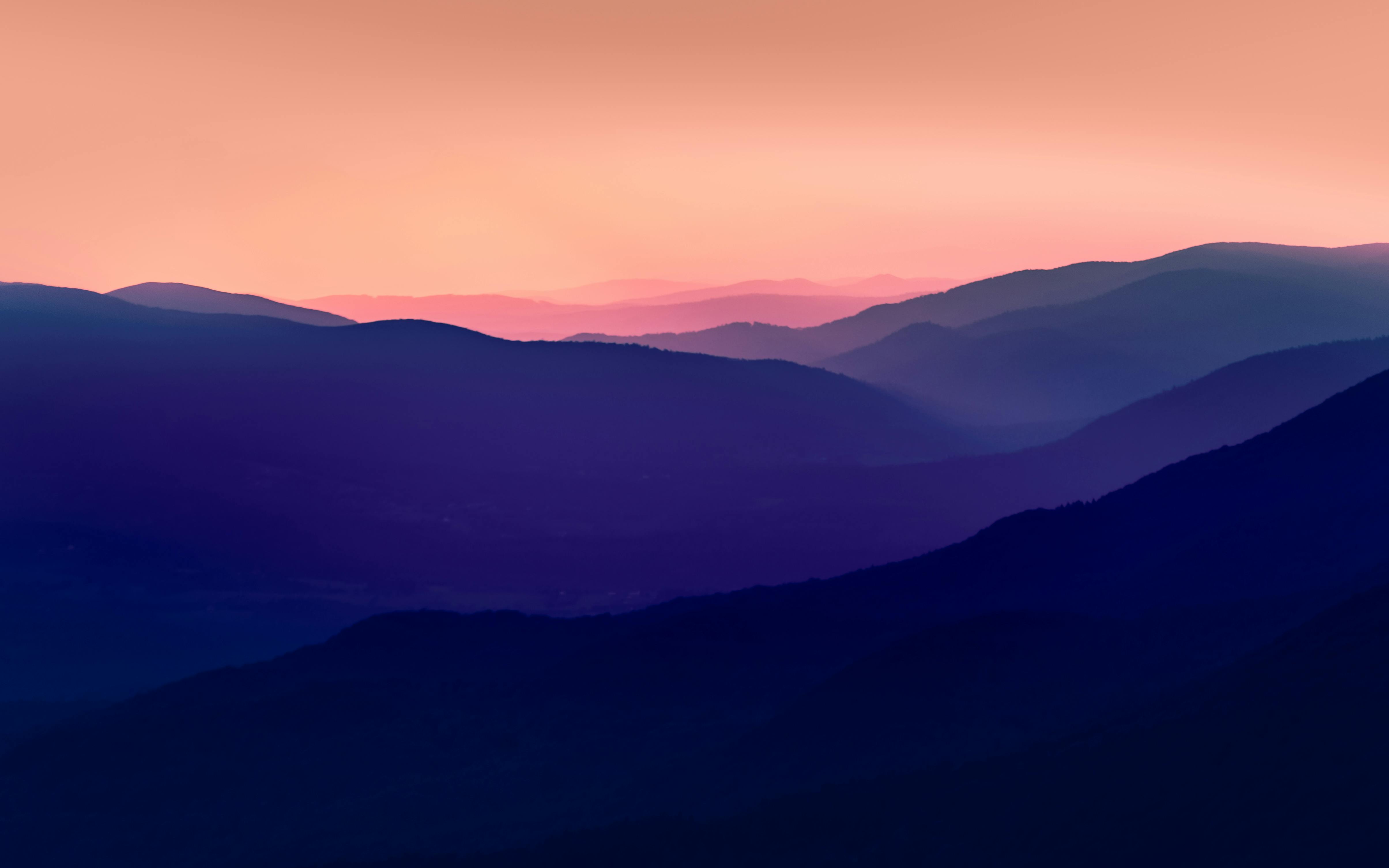 Breathtaking twilight view of Podkarpackie Voivodeship's mountain range with vivid hues