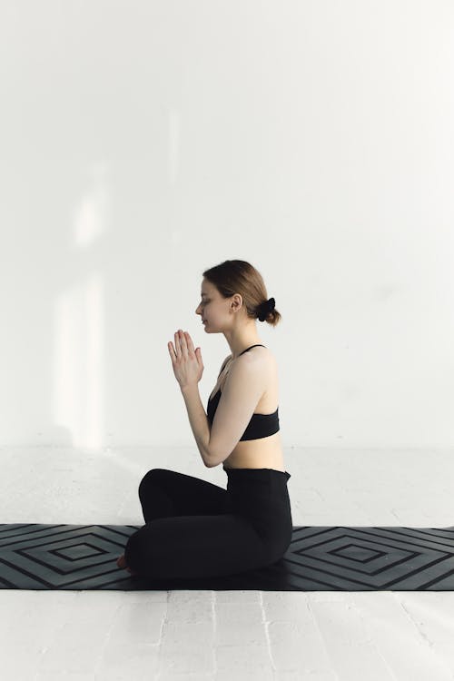 Free A Woman Doing a Yoga  Stock Photo