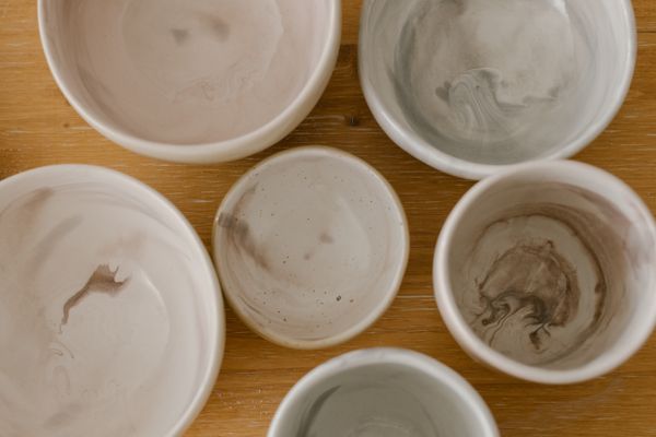 Marbled ceramic bowls seen from above, photo by cottonbro studio on Pexels