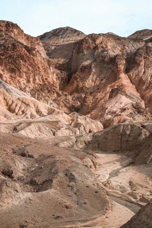 Free Explore the raw beauty of a rocky canyon with unique geological formations and erosion patterns. Stock Photo