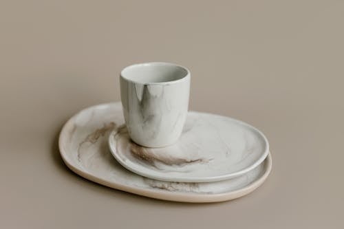 Free Close-up Photo of Ceramic Flatware and Cup  Stock Photo