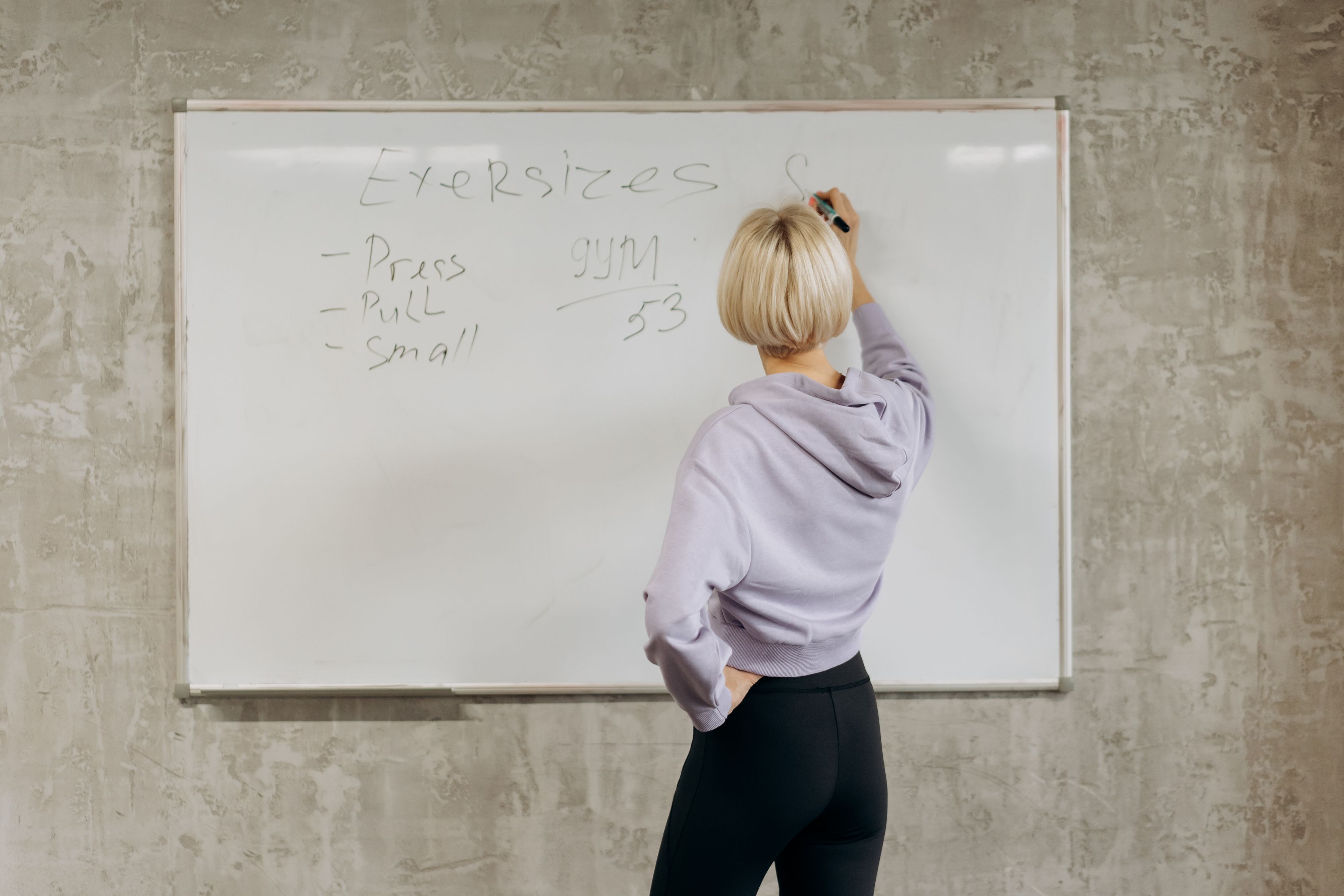 Writing Whiteboard Woman Writing On Whiteboard · Free Stock Photo