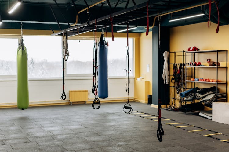 A Spacious Gym With Tools And Equipments