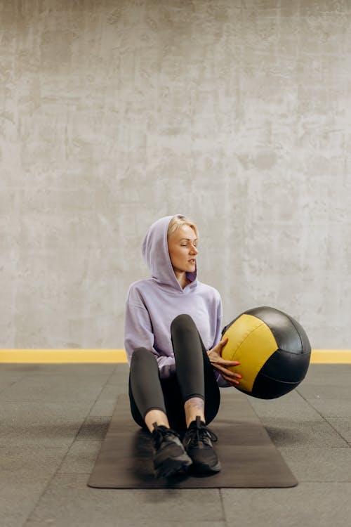 Woman Holding An Exercise Ball