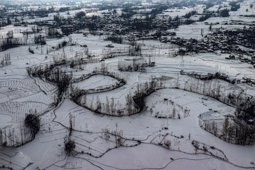 Aerial Footage of Snow Covered Land