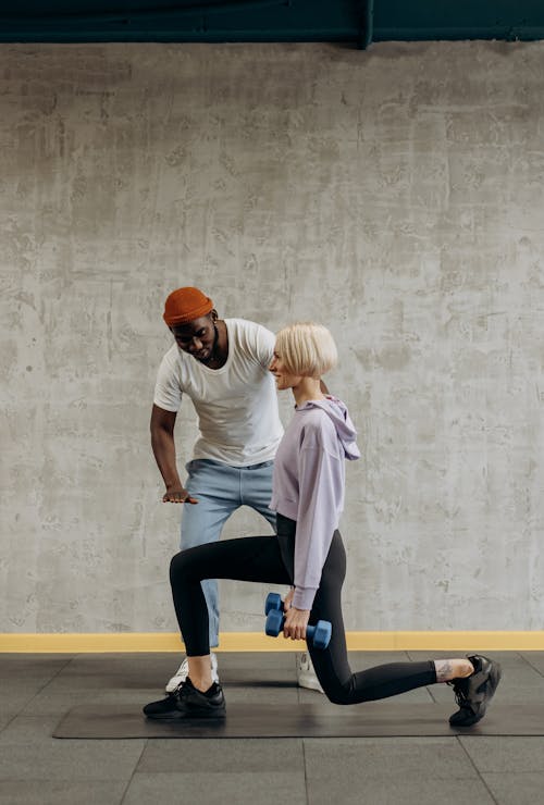 Three Women Wearing Sports Bras and Leggings · Free Stock Photo