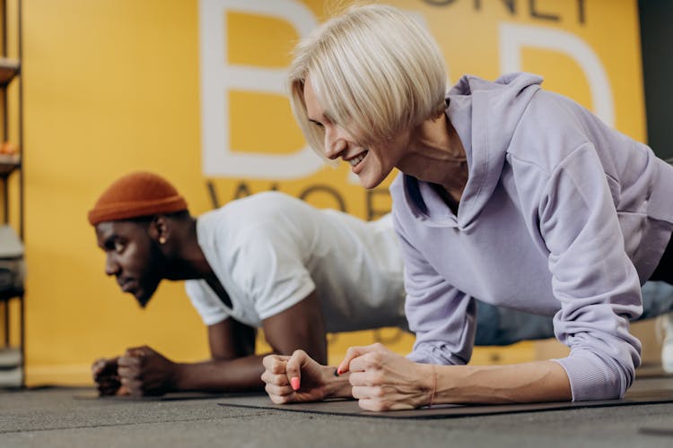 Man And Woman Doing Push Ups