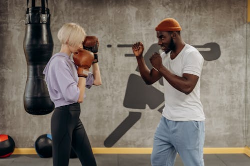 Man And Woman Doing Punching Exercise