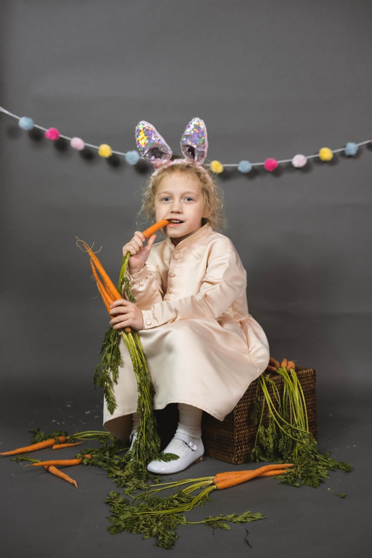 Kid Eating A Carrot