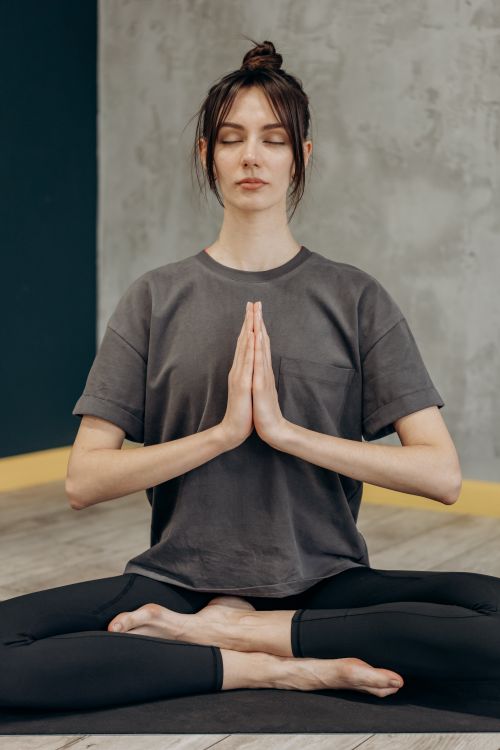 Woman Sitting In A Yoga Position · Free Stock Photo