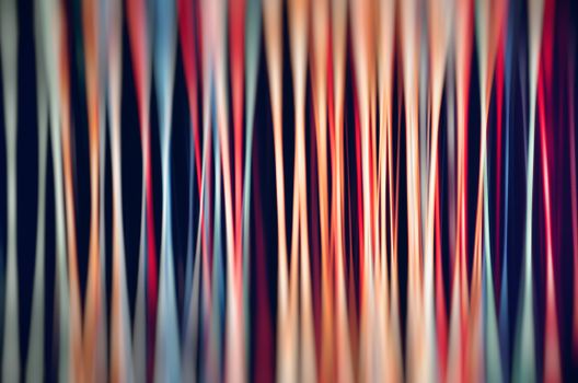 Vibrant abstract design with flowing multicolored wavy lines for creative backgrounds.