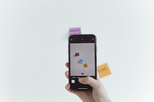 Free Person Holding Black Iphone  Stock Photo
