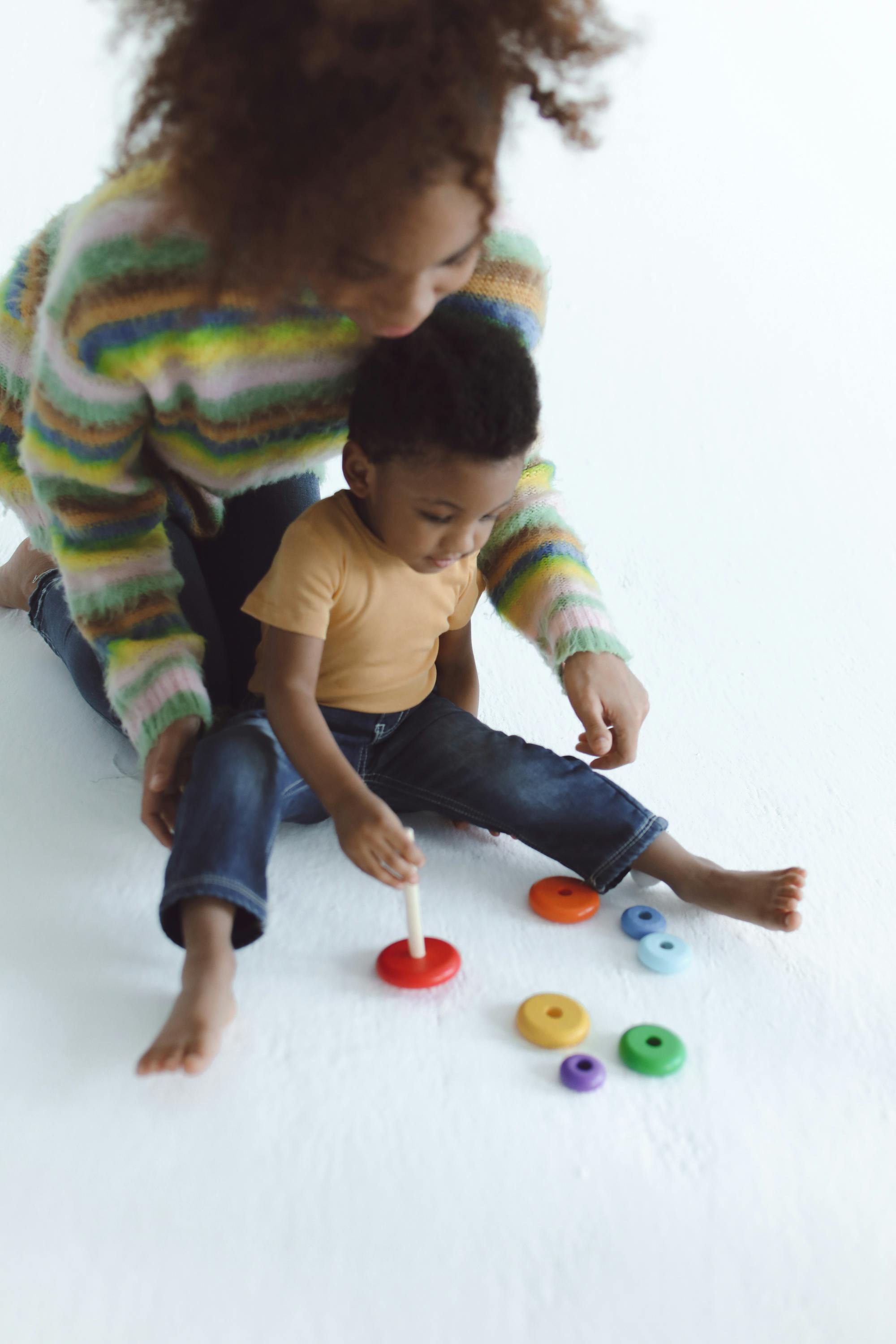 mother playing with her son