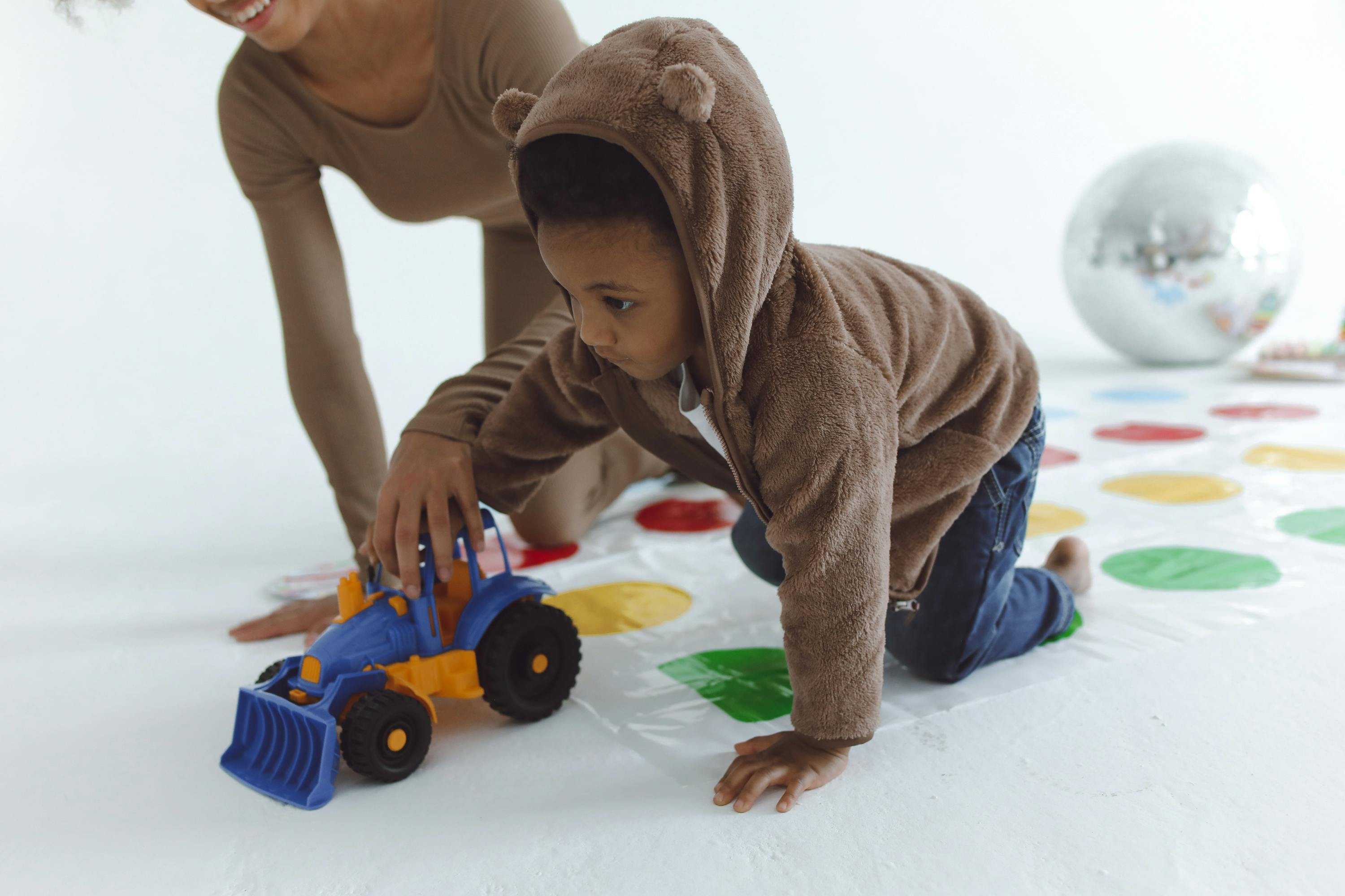 person playing with the boy