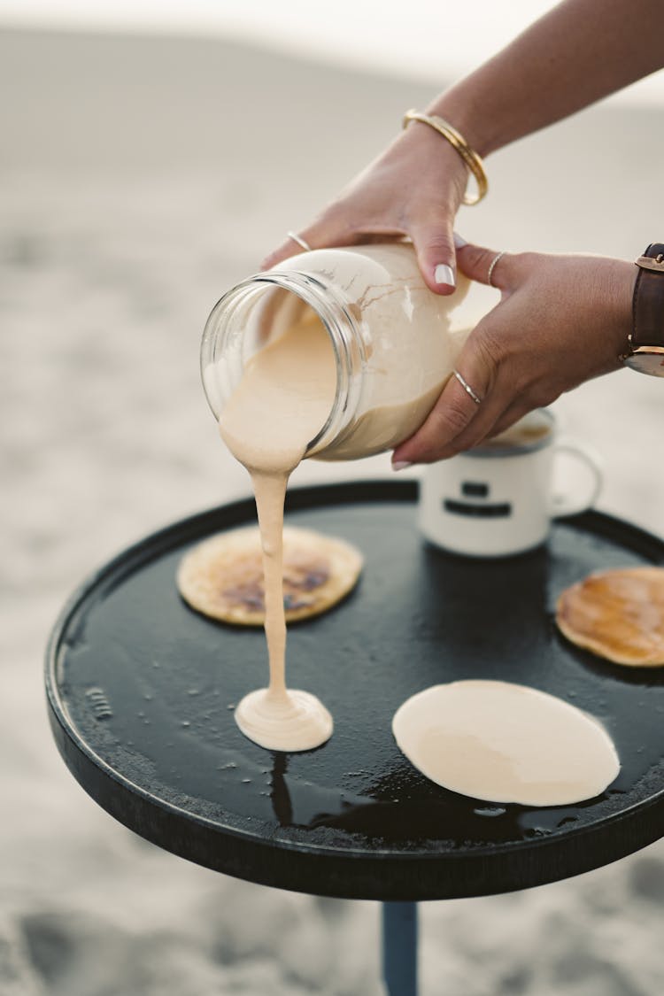 Person Cooking Pancakes