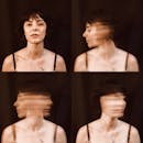 Serious woman with short hair on brown background