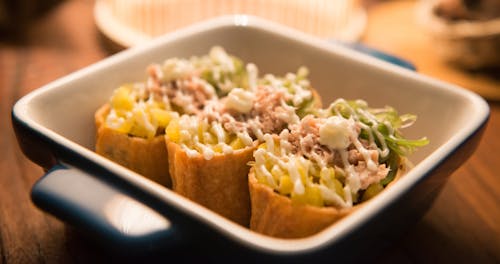 Three Tacos on Black And White Ceramic Bowl