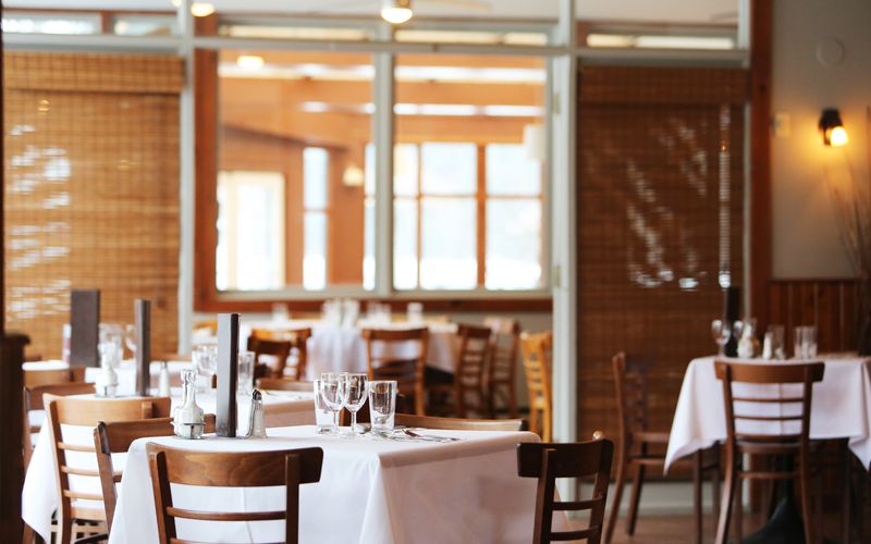 Busy restaurant interior with diners enjoying meals