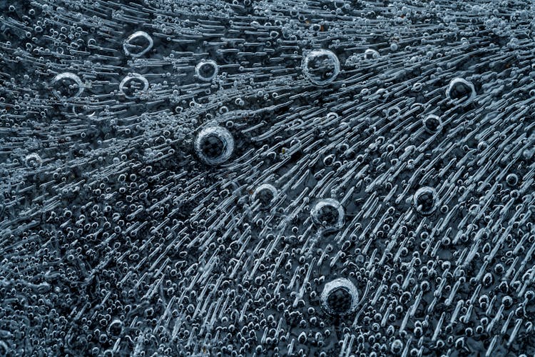 Abstract Black Background With Bubbles And Hatching