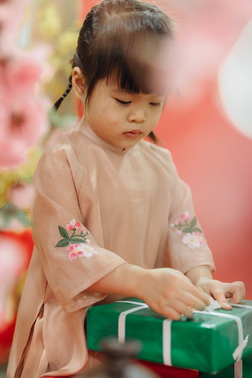 A Girl Opening a Gift 