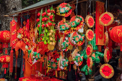 Red and Green Chinese Lanterns Hanging on the Store