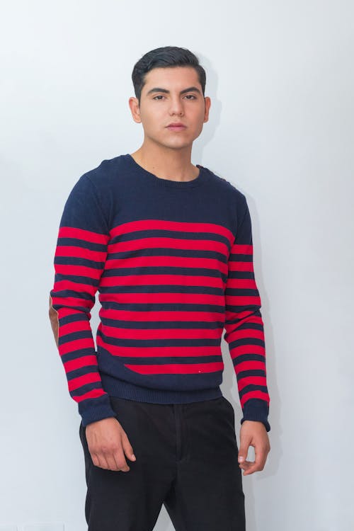 Man in Striped Sweater Posing