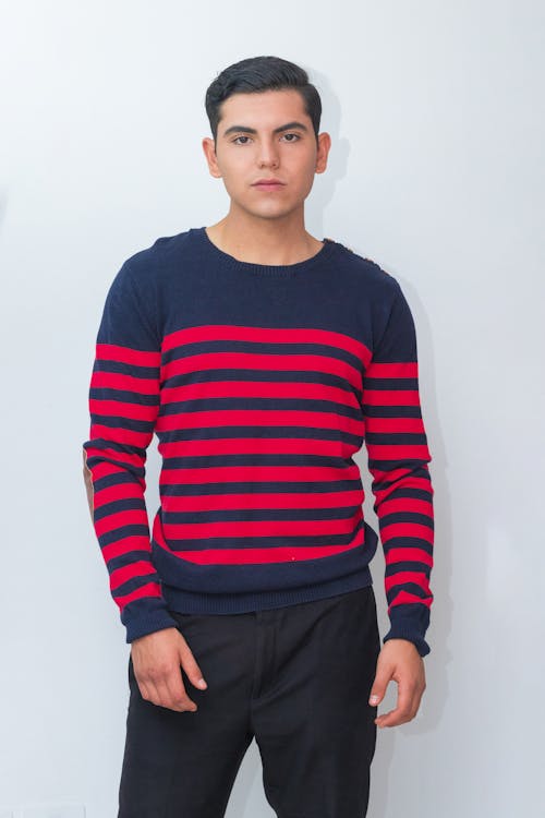 Free A Man in a Striped Sweater  Stock Photo
