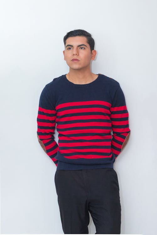 A Man Wearing a Striped Long Sleeve Shirt