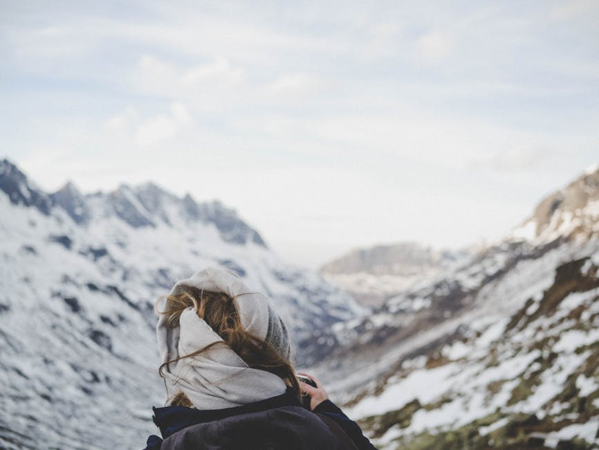 Person on Snow-covered Mountain · Free Stock Photo