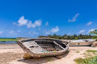Abandoned Boat by the Shore