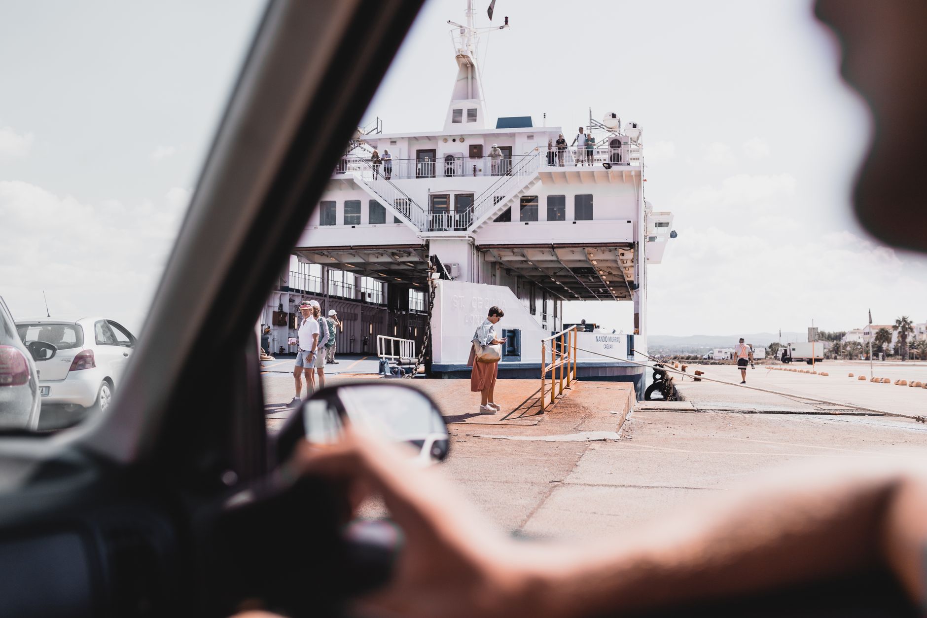 Mykonos ferry port with boats and terminal building