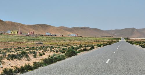 Free Captivating landscape view of Irherm village, mountains, and road in Souss-Massa, Morocco. Stock Photo