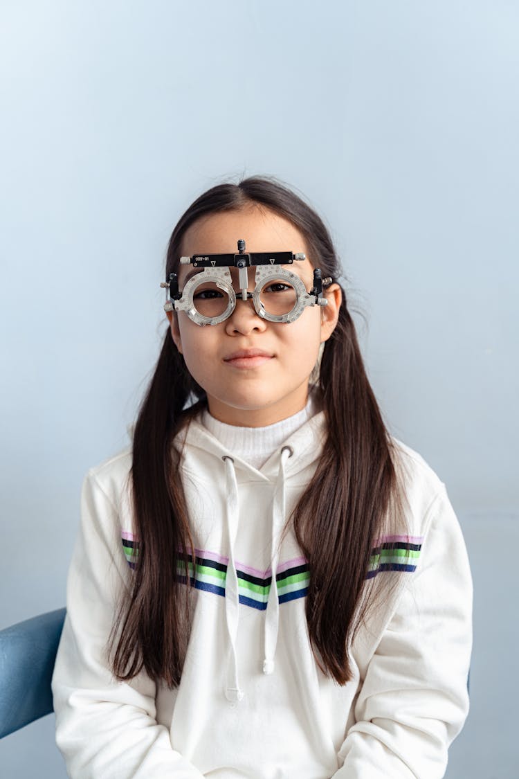 Girl Wearing A Trial Lens Frame