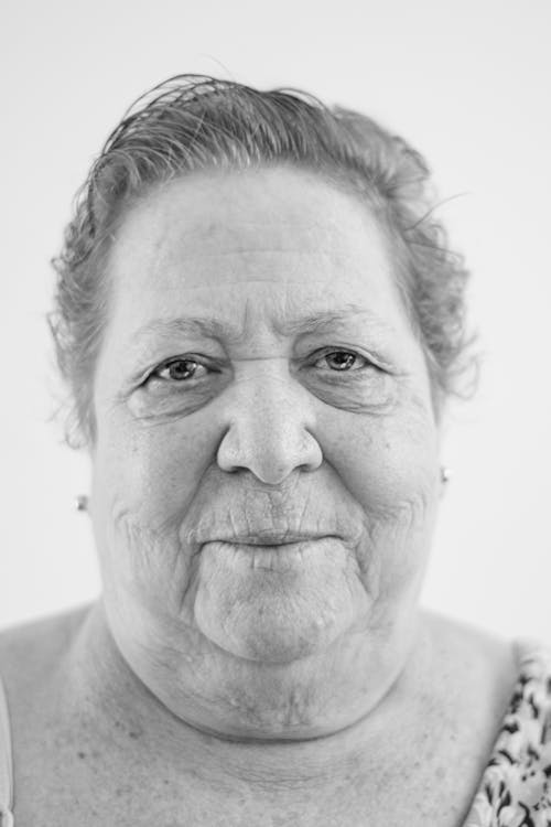 Free Grayscale Photo of an Elderly Woman Stock Photo