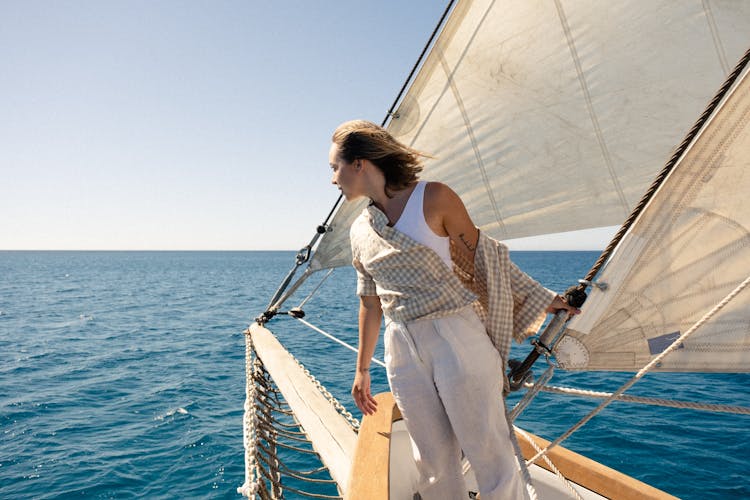 Woman Sailing On A Boat 