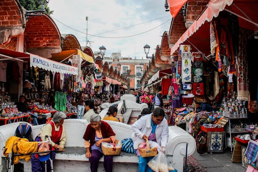 Vibrant street market in Puebla, Mexico featuring local vendors selling handcrafted goods.